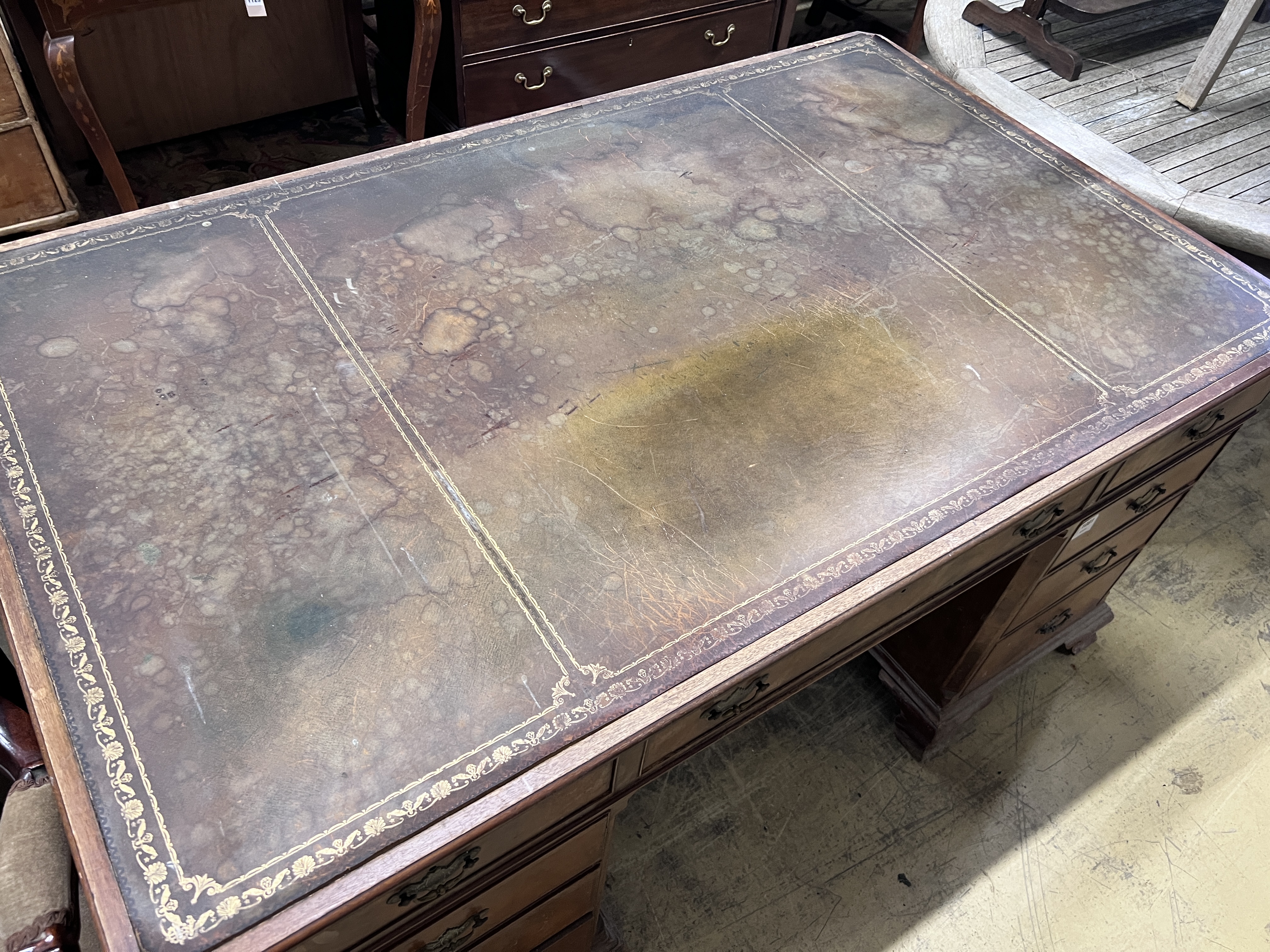 A walnut pedestal desk, width 153cm, height 91cm